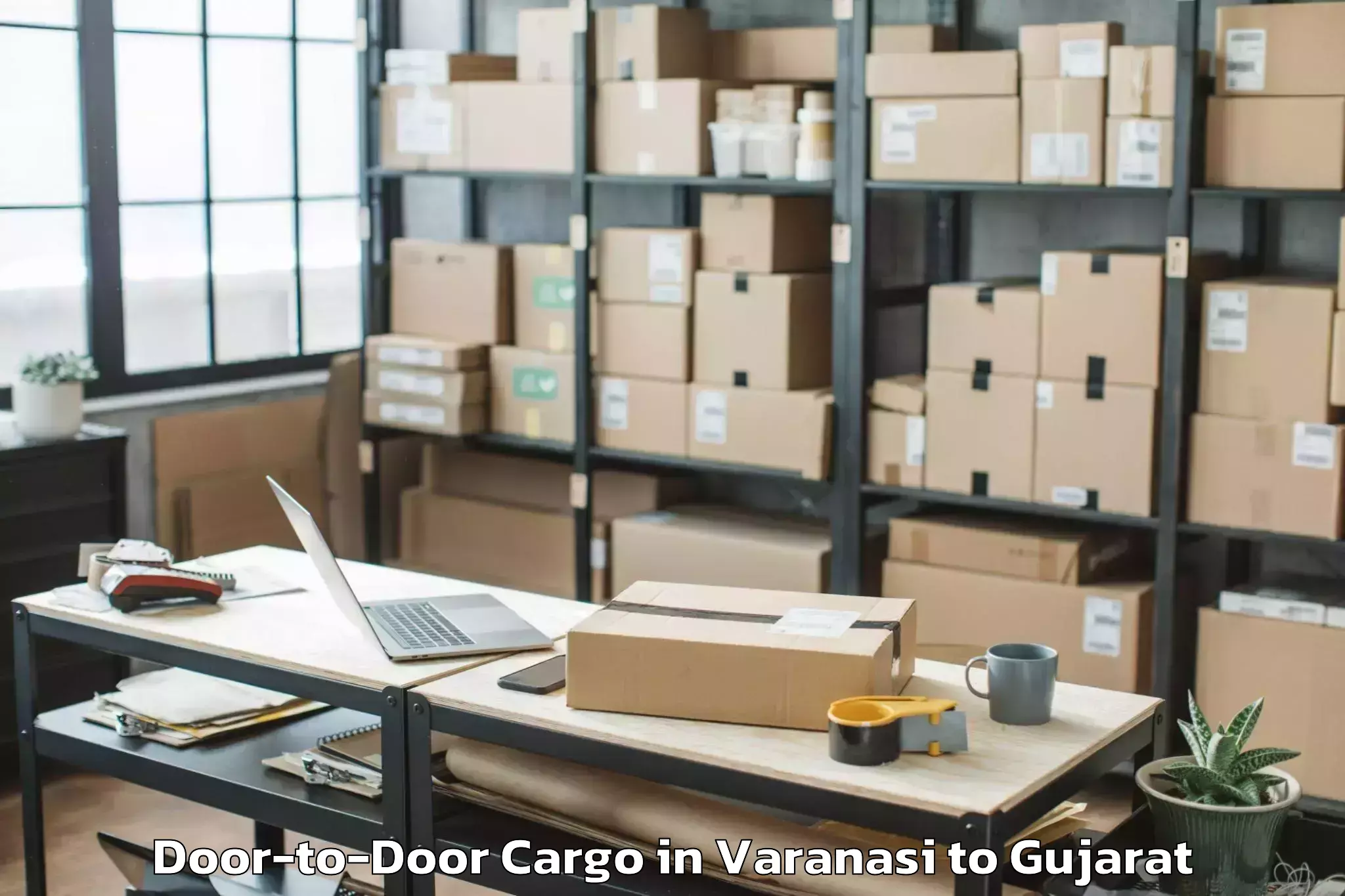 Quality Varanasi to Vadali Door To Door Cargo